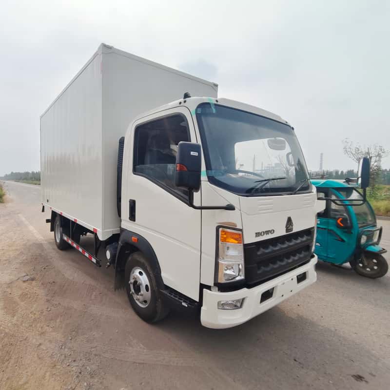 Транспортное средство HOWO 5000L с левосторонним открыванием кузова.